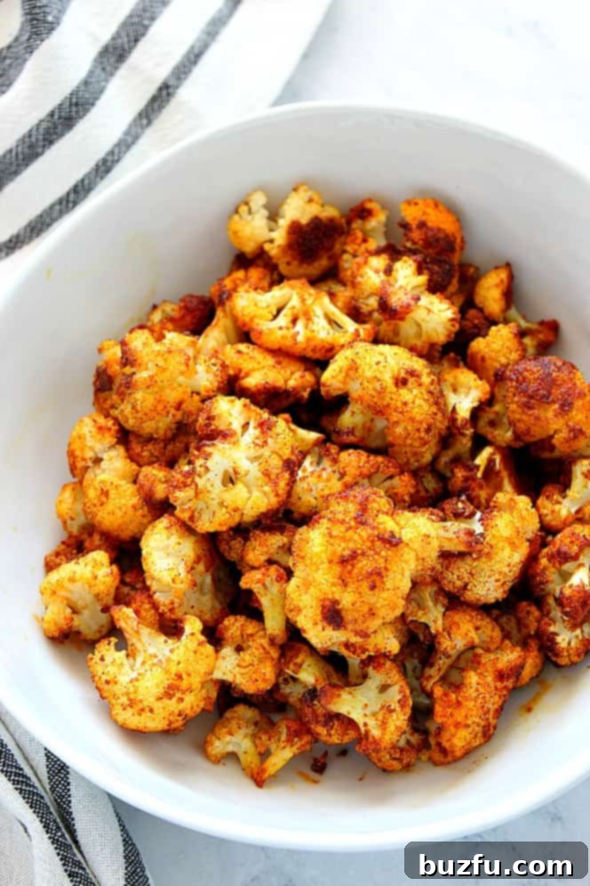 Delicious Shawarma Roasted Cauliflower in a serving bowl, ready to be enjoyed as a vibrant main or side dish.