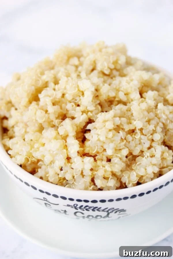 1-Minute Instant Pot Quinoa Recipe - the fastest way to cook perfectly fluffy quinoa in your pressure cooker! A great time-saver for meal prep or busy weeknights. Instant Pot quinoa in a small bowl.