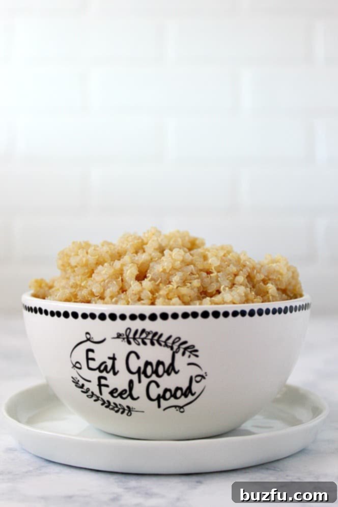 1-Minute Instant Pot Quinoa Recipe - the fastest way to cook perfectly fluffy quinoa in your pressure cooker! Great time-saver for meal prep or busy weeknights. cooked quinoa in bowl