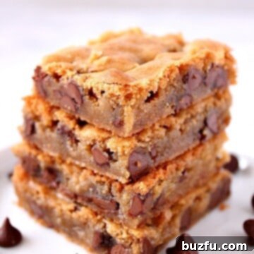 Stack of freshly baked chocolate chip blondies.