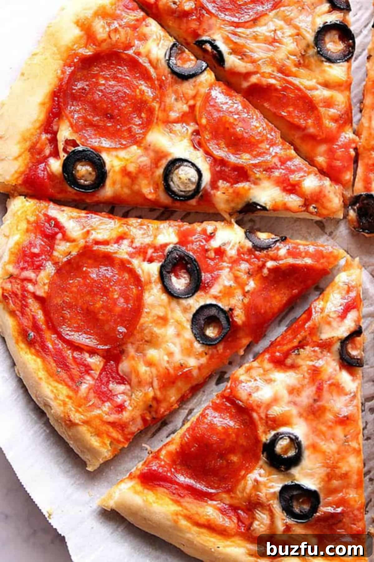 Delicious slices of no-yeast pizza, topped with melted cheese and pepperoni, ready to be enjoyed.