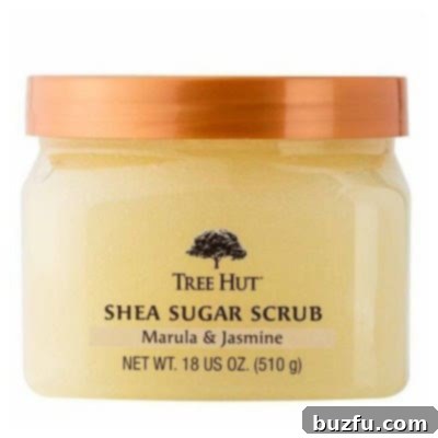 Tree Hut Marula & Jasmine Sugar Scrub: Summer Scent and Smooth Skin A close-up shot of the Tree Hut Shea Sugar Scrub in Marula & Jasmine scent, highlighting its rich texture and appealing packaging.