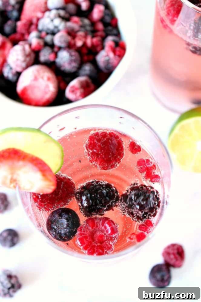 Overhead shot of sangria made with rose wine and frozen berries.