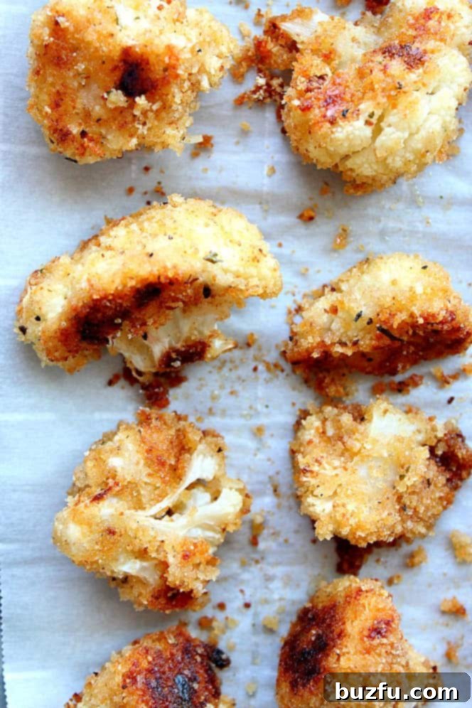 Overhead shot of golden crispy cauliflower bites. 
