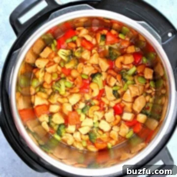 Instant Pot cashew chicken in the pressure cooker.