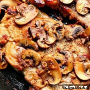 Delicious Garlic Butter Mushroom Pork Chops, a quick and flavorful dinner.