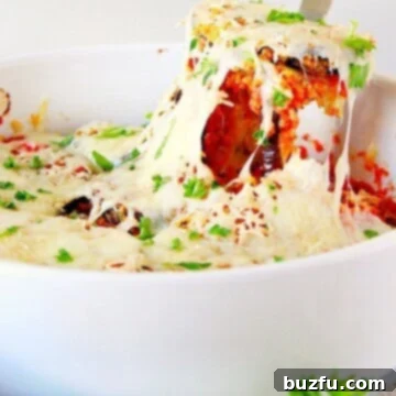 Ultimate Baked Eggplant Parmesan 2 Baked Eggplant Parmesan in white baking dish.