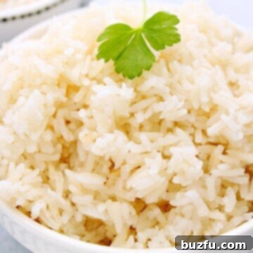Perfect Instant Pot Rice 2 Cooked Instant Pot Fluffy Rice in a white bowl.