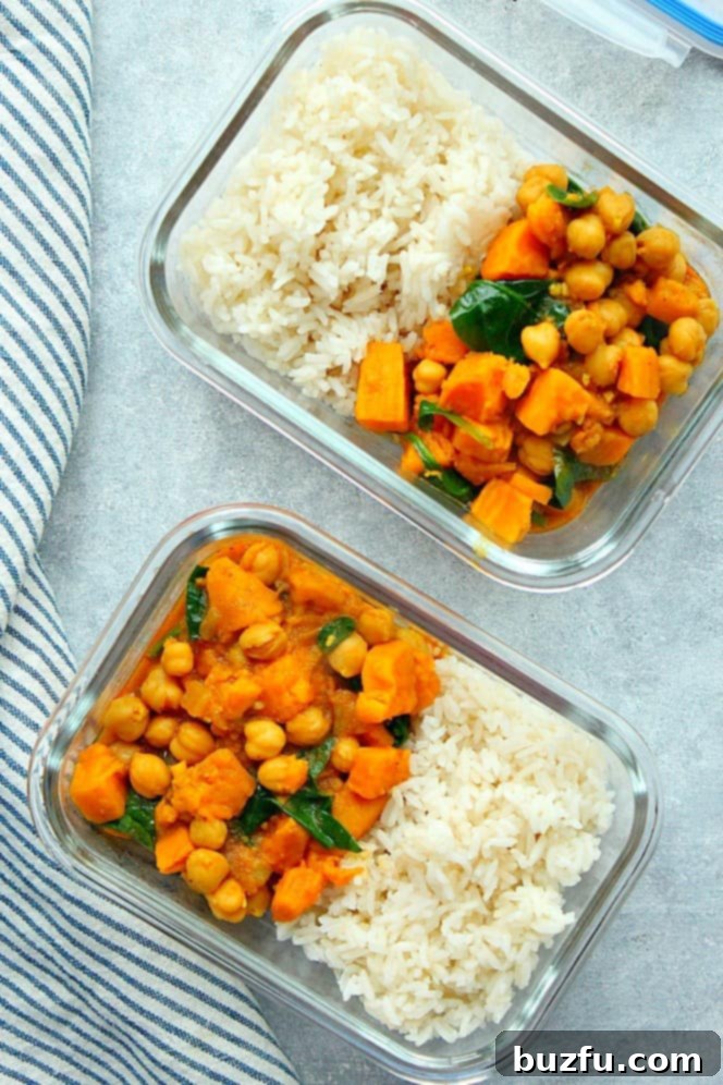 Instant Pot Sweet Potato Curry Recipe (Meal Prep) - easy vegetarian curry made with chickpeas, sweet potatoes and spinach. Perfect with rice for a simple meal prep throughout the week! Overhead shot of two glass meal prep containers with rice and Instant Pot sweet potato curry.