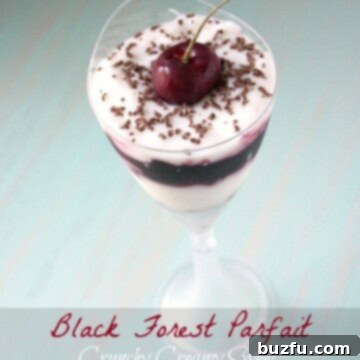 Delicious Black Forest Parfait, layered with cherry sauce, vanilla yogurt, and a cookie crust.