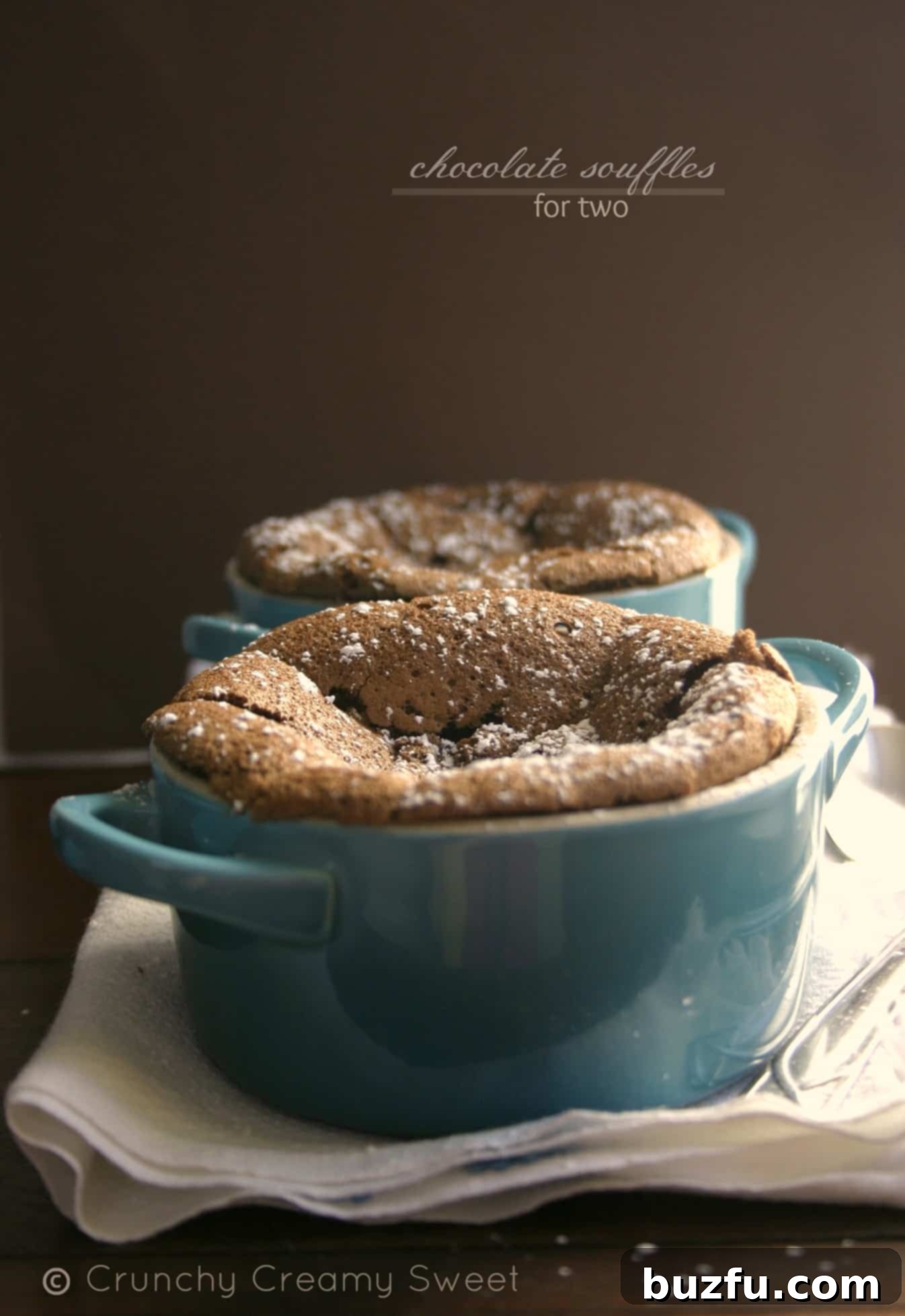 Decadent Chocolate Souffles Gloriously puffed chocolate souffles, a decadent dessert rich in flavor