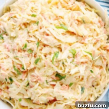 Creamy Coleslaw in large white salad bowl.