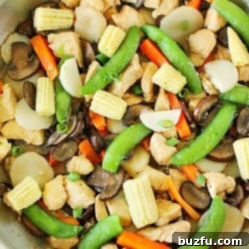 Moo Goo Gai Pan in a stainless steel pan, perfectly cooked.