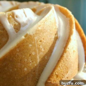 Lemon Bundt Cake side view with glaze.