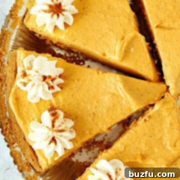 No Bake Pumpkin Pie sliced in pie plate.