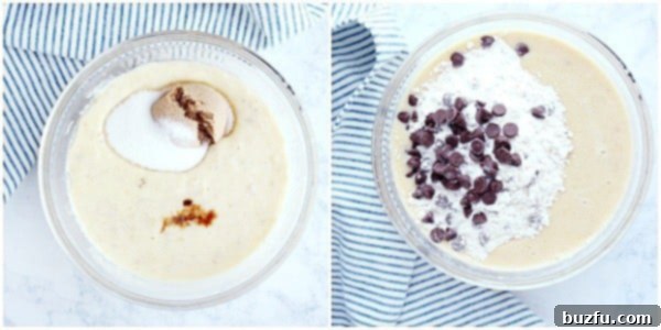 Mixing Dry Ingredients and Chocolate Chips into Banana Bread Batter The banana mixture, now enriched with sugars, in a glass bowl. Dry ingredients like flour and a generous portion of chocolate chips have been added, poised for gentle mixing to form the banana bread batter.