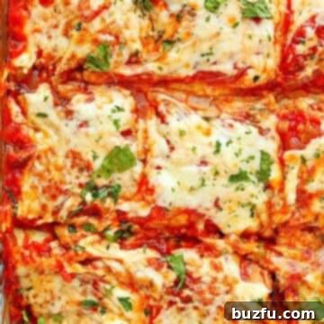 Aubergine Stack Bake 3 Eggplant Lasagna in a glass baking dish.