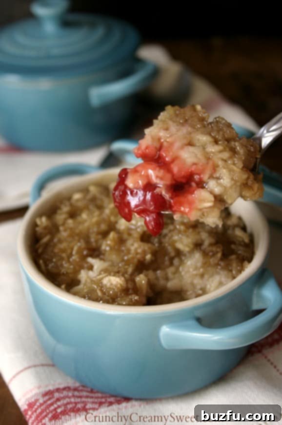 Fruit On the Bottom Bruleed Oatmeal | CrunchyCreamySweet.com Fruit On the Bottom Bruleed Oatmeal served in ramekins, showcasing the vibrant fruit and golden topping.