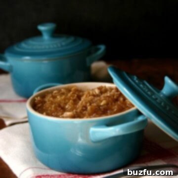 Bruleed Oatmeal with Hidden Fruit 2 Fruit On the Bottom Bruleed Oatmeal in a ramekin, showcasing the golden bruleed topping and fruit base.