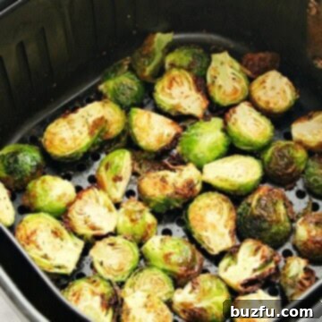 Air Fryer Brussels Sprouts in air fryer basket.