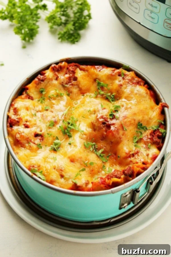 Instant Pot Lasagna in baking pan next to Instant Pot.