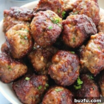 Authentic Greek Keftedes 2 Close-up of a serving bowl filled with authentic Greek Meatballs (Keftedes).
