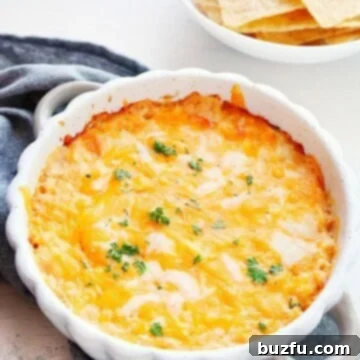 Hot Crab Dip in a round baking dish.