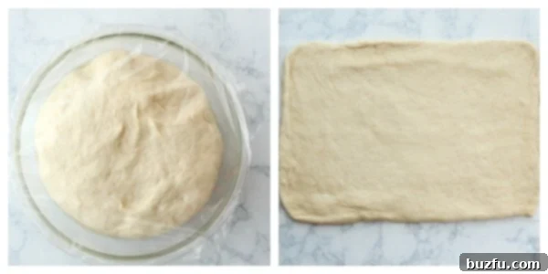 Let the dough rise until doubled in size. A bowl of dough covered with plastic wrap, rising in a warm environment.