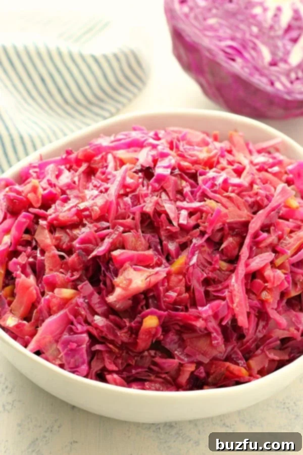 Braised red cabbage in a white bowl, ready to serve.