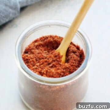 Perfect Homemade Taco Spice Mix 3 Taco seasoning in a glass jar.