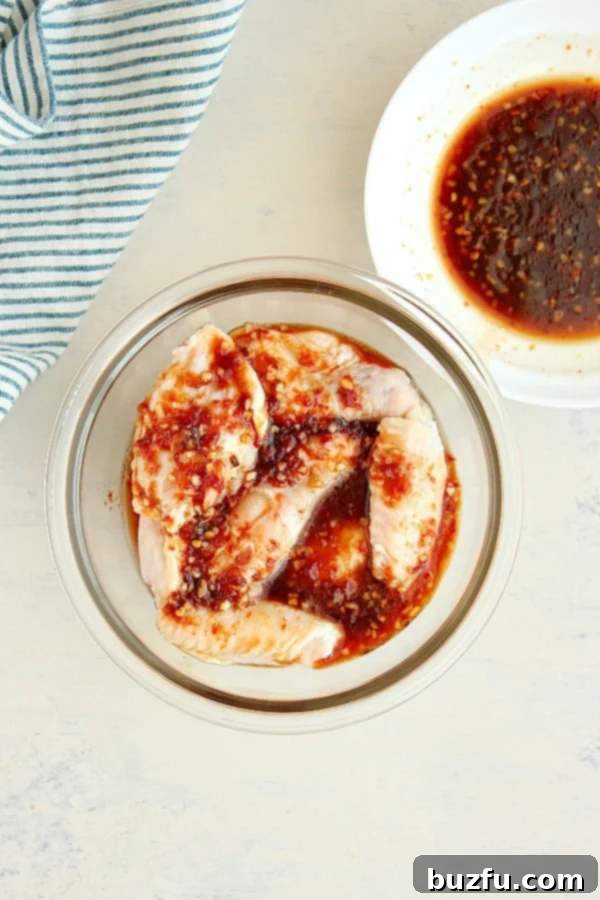 Chicken wings in marinade.