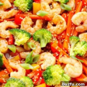 Sizzling Shrimp Stir-Fry 3 Shrimp stir fry in a pan.