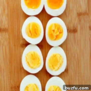 Perfectly Boiled Eggs Every Time 3 Boiled eggs on a cutting board.