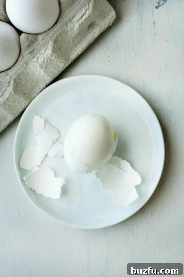 How to make eggs that peel easily. A perfectly peeled egg on a plate.