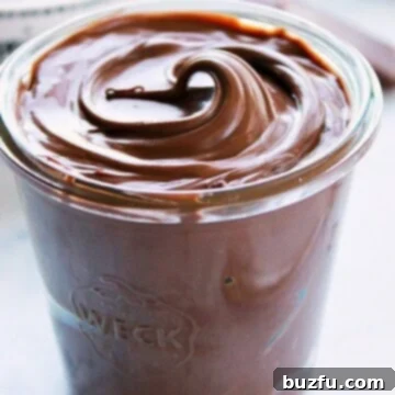 Velvety Homemade Chocolate Hazelnut Spread 3 Homemade Nutella in a glass jar, a perfect, rich spread.