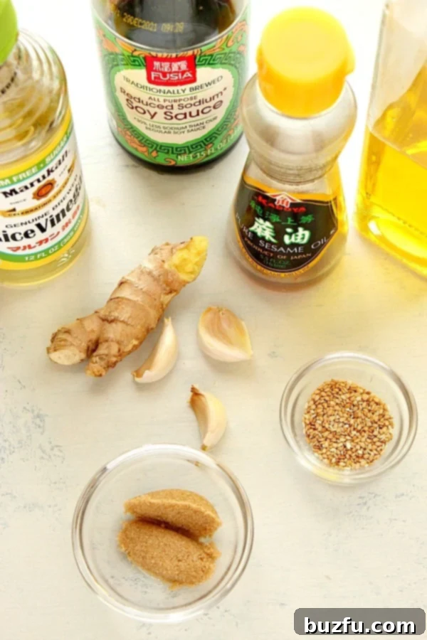 What do you need to make Sesame Dressing. Ingredients for salad dressing on a board.