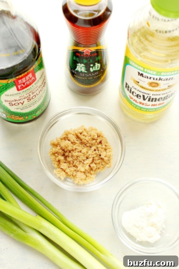 Ingredients for stir fry sauce laid out: soy sauce, rice vinegar, sesame oil, brown sugar, and cornstarch.
