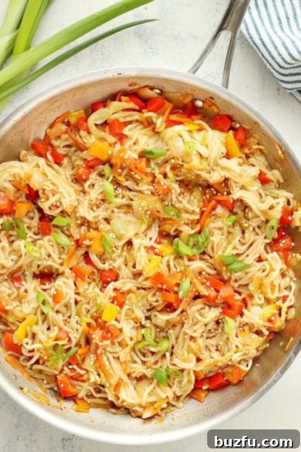 A colorful and delicious ramen stir fry with mixed vegetables, ready to be served.