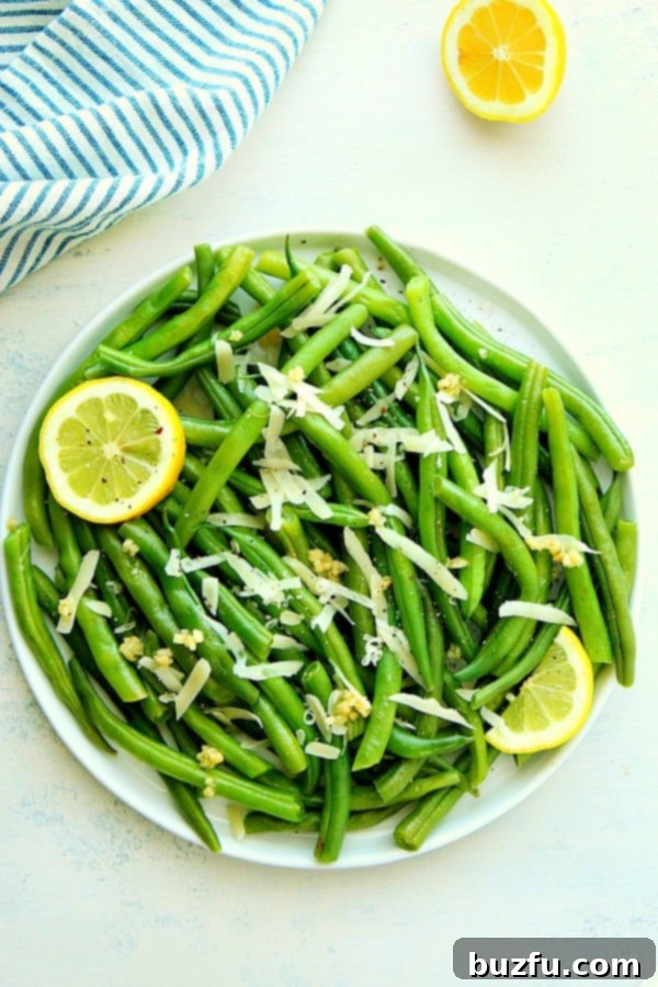 Snaps 5 A bowl of freshly steamed Instant Pot green beans, ready to be served as a healthy side dish.