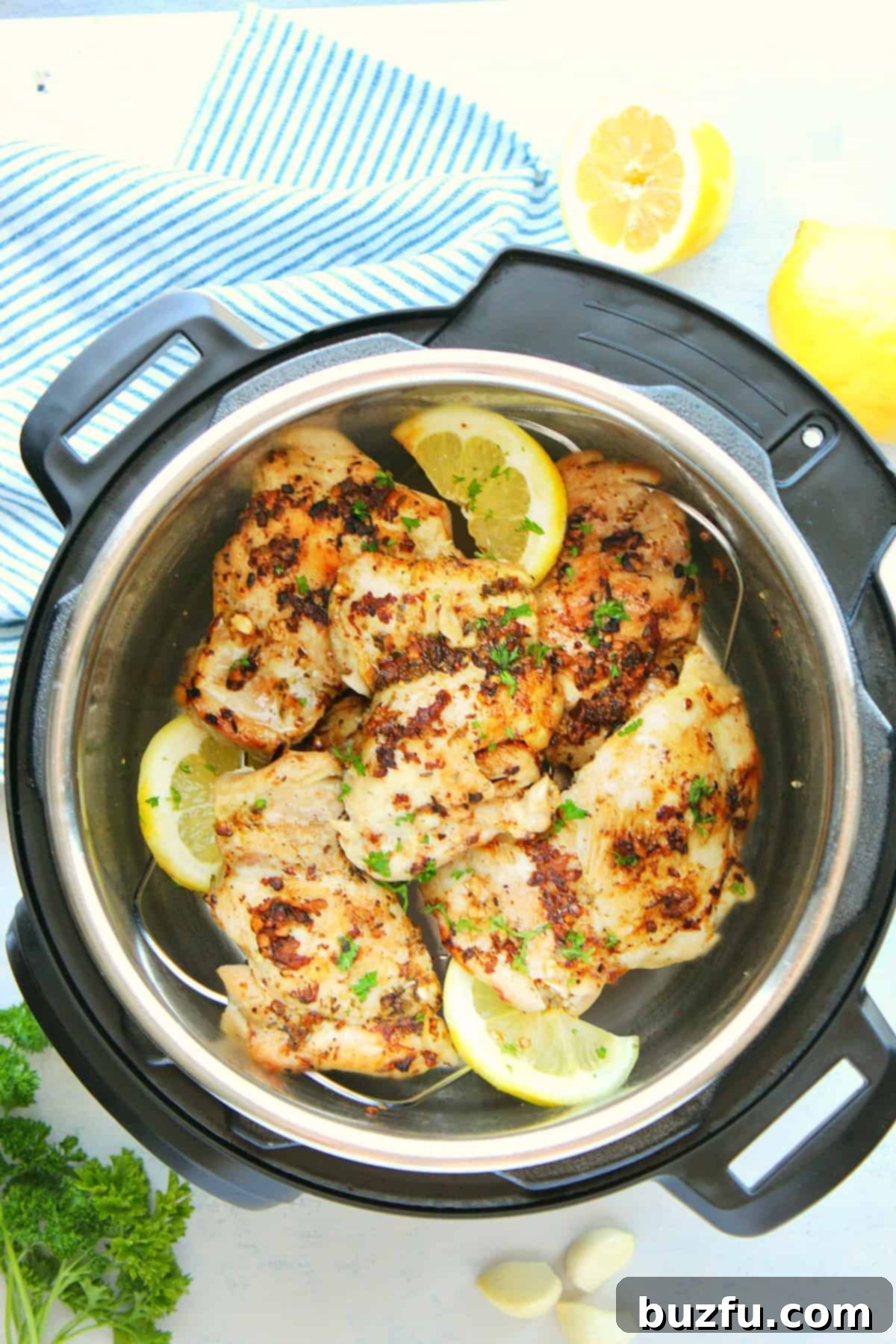 Chicken thighs in the Instant Pot with lemons.