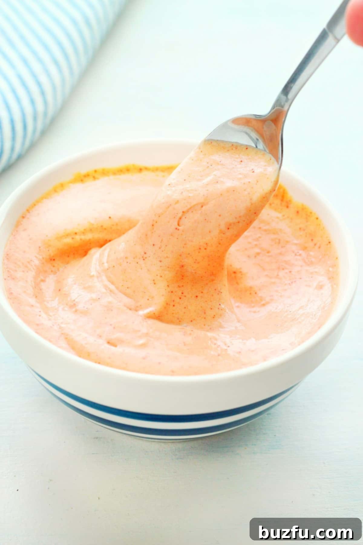 Best Homemade Yum Yum Sauce Recipe A vibrant bowl of homemade Yum Yum Sauce, ready to be served, capturing its creamy texture and inviting color.