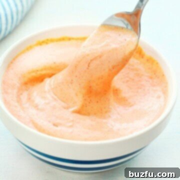 Golden Umami Dream 3 A bowl of Korean sauce, capturing its creamy texture and inviting color.