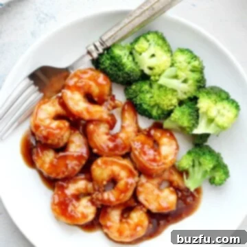 Shrimp and broccoli on a plate.