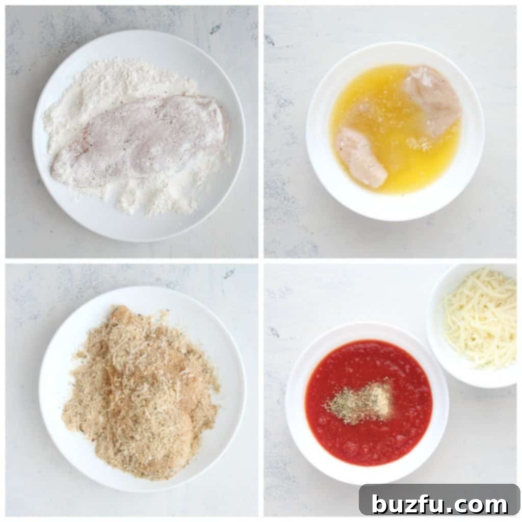 A three-dish breading station showing flour, melted butter, and breadcrumbs with parmesan, ready for chicken cutlets.