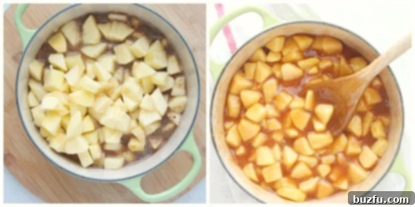 Close-up of apple slices simmering in a sweet, spiced syrup in a pot on the stovetop, demonstrating the cooking process.