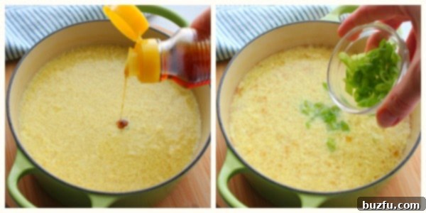 Garnishing Egg Drop Soup with Sesame Oil and Green Onions A ladle of Egg Drop Soup with a drizzle of sesame oil and a garnish of fresh green onions, demonstrating the final touches before serving.
