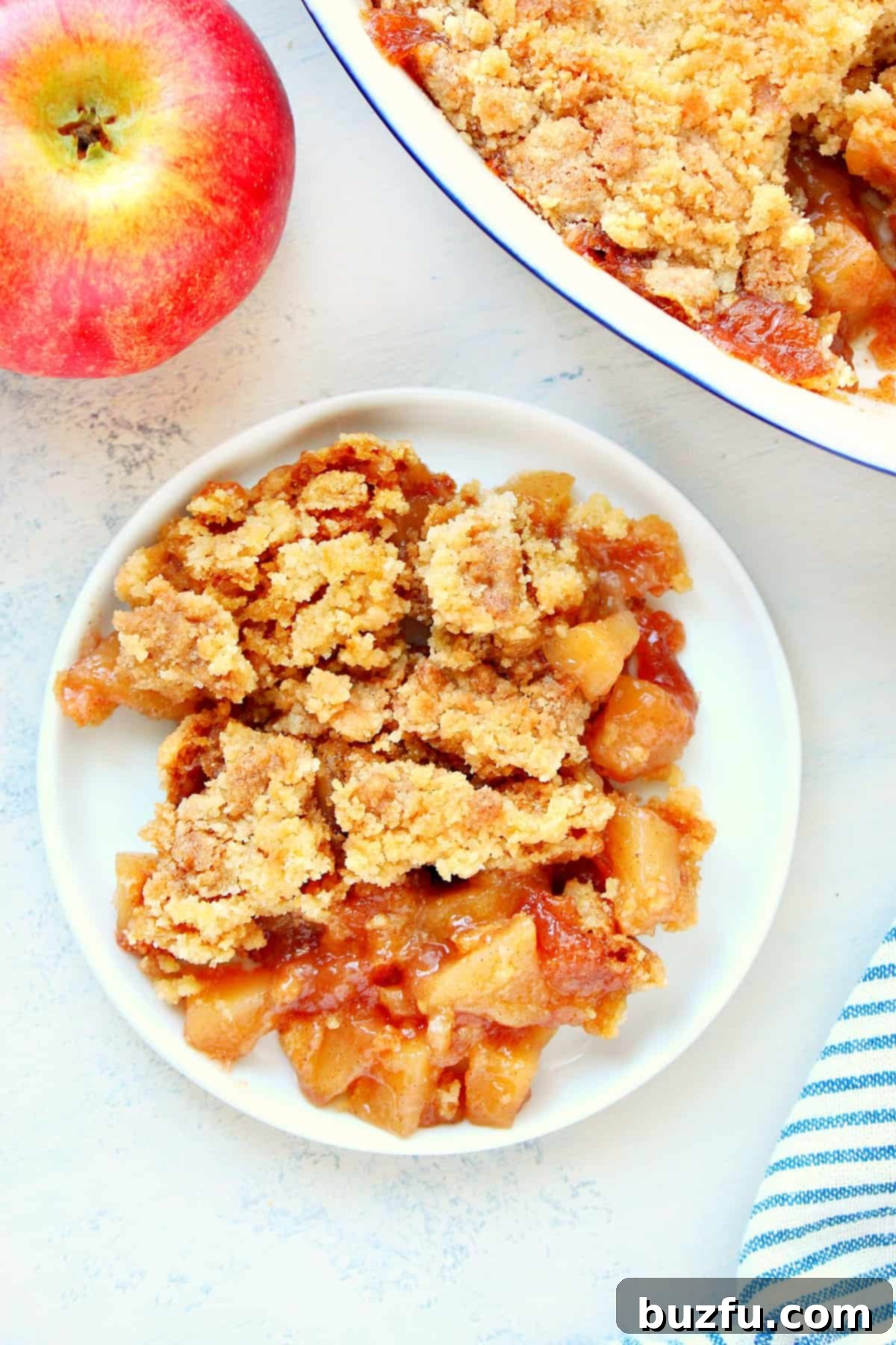 Apple Dump Cake from scratch recipe Apple cake on a plate.