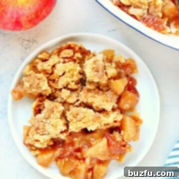 Effortless Homemade Apple Dump Cake 3 Apple cake on a plate.