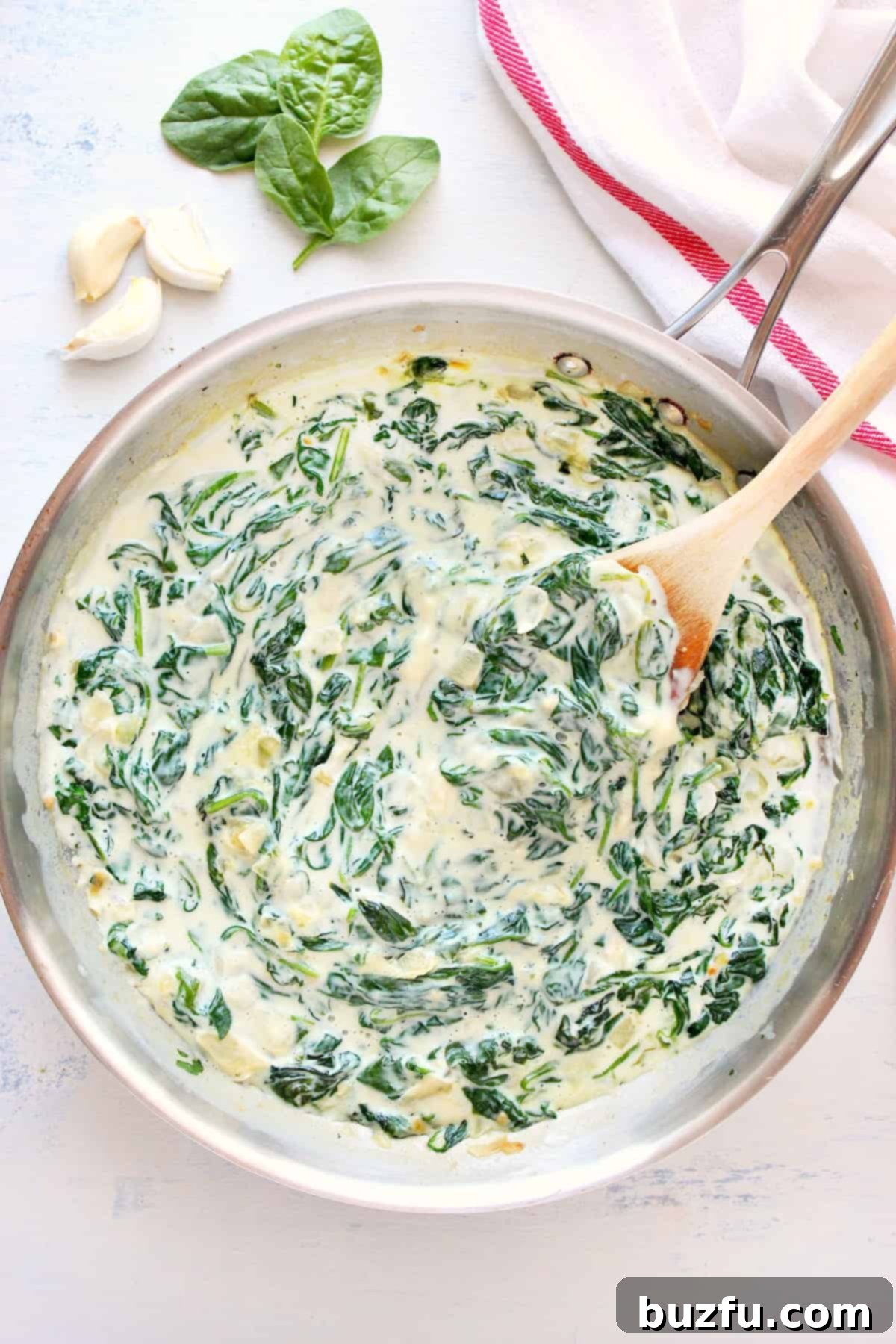 Creamy spinach in a skillet, ready to serve.