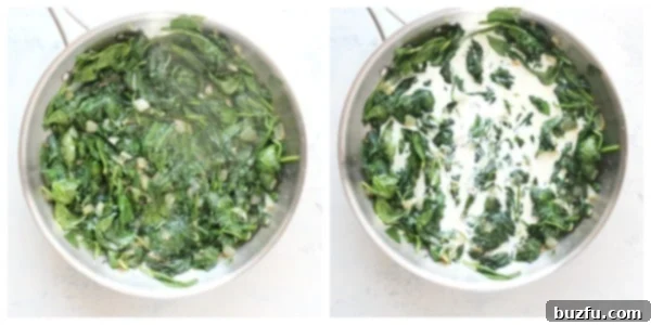Creamy sauce being added to sauteed spinach in a pan.